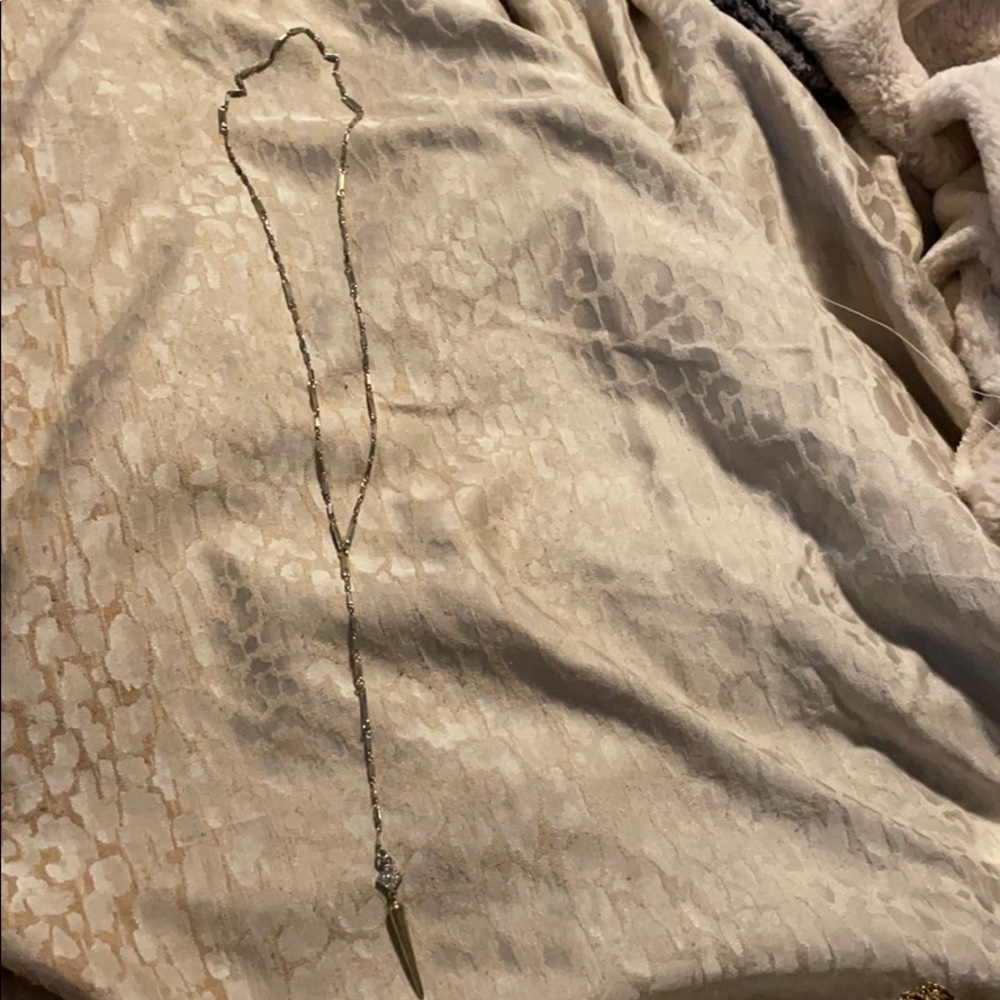 Gold lariat necklace with pave detail